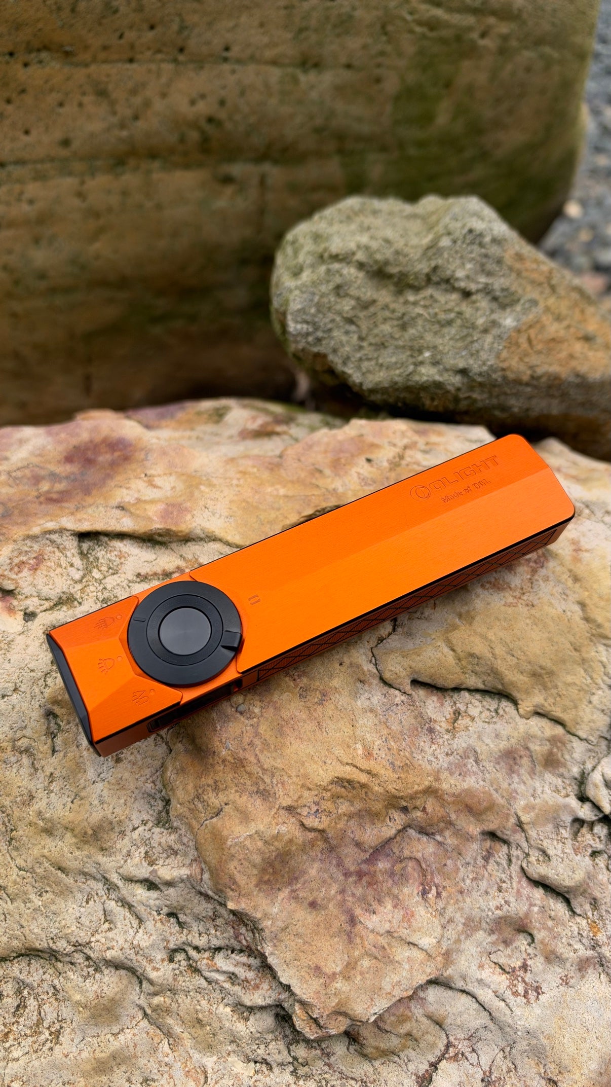 Orange amber OLIGHT ArkPro Ultra flashlight